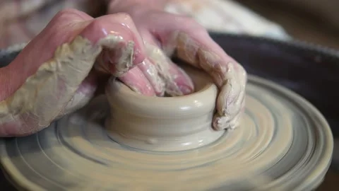 Potter making ceramic pot on the twisted pottery wheel.Potter at work, close up. 스톡 동영상 162811417