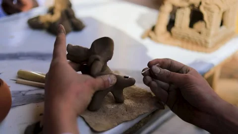 Potter making ceramic toy 動画素材 281053740