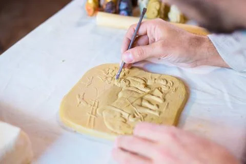 Potter making clay stamp picture Stock Photos