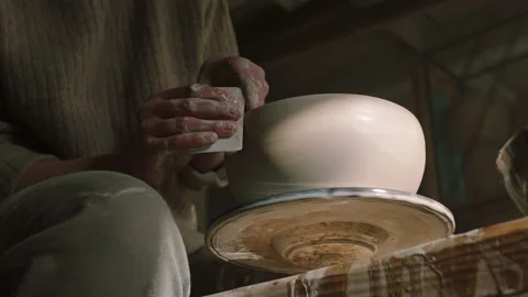 Potter Is Making Pot of Raw Clay On Potter's Wheel Stock Footage 156083044