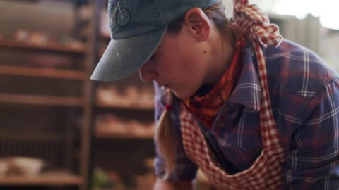A potter making a vase in an art studio Stock Footage 138592789