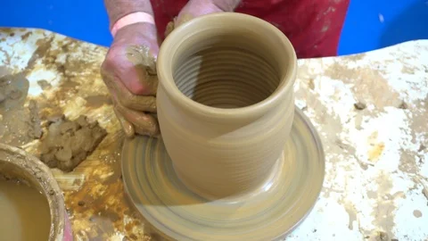 Potter Modeling Ceramic Pot From Clay On A Potter's Wheel Stockbeeldmateriaal 121878234