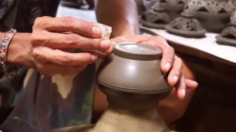 The potter is molding the clay pot Stock Footage 79070334