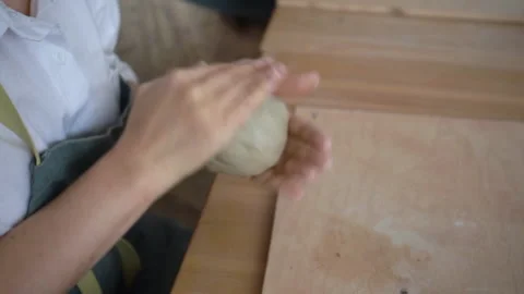 A potter prepares clay for clay modelling. Pottery workshop class. Video stock 221266330