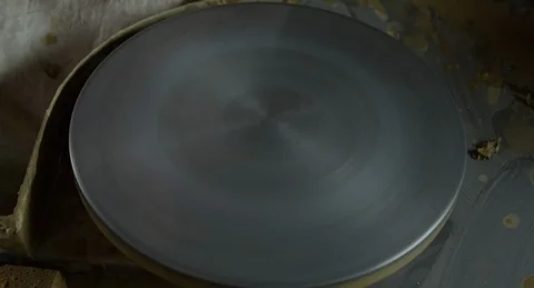 Potter preparing clay base for producing of a pitcher. Stock Footage 101288792