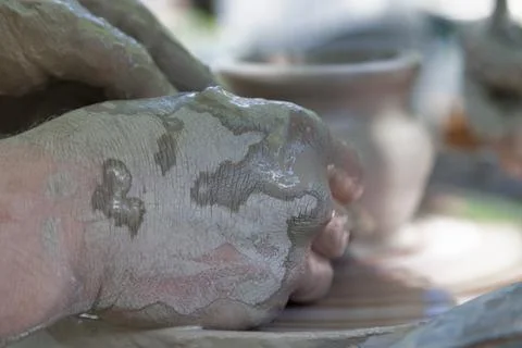 Potter shaping a ceramic pot Stock Photos