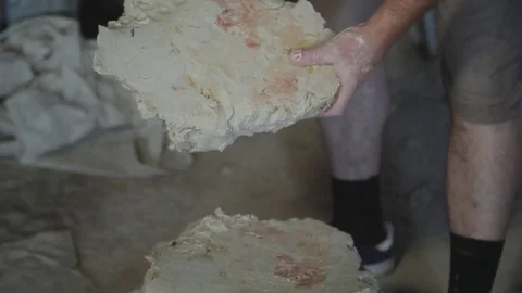 Potter takes clay for work Stock Footage 74419795