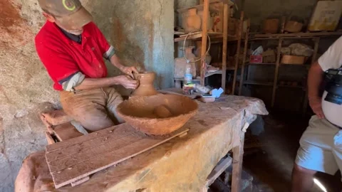 Potter at work in his artisanal workshop in   Stock Footage 294751399