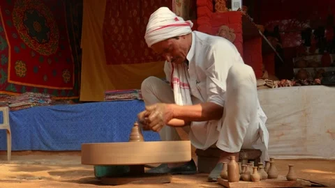 Potter at work makes ceramic dishes. India, Rajasthan. Stock Footage 210805438