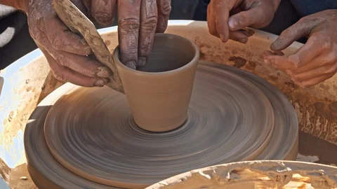 Potter Working with Apprentice Video stock 116626994