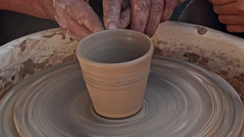 Potter Working with Apprentice Stock Footage 153633219