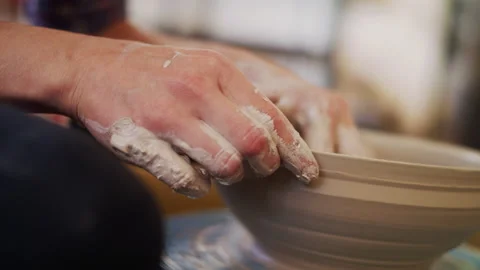 A potter working in an art studio Stock Footage 138593943