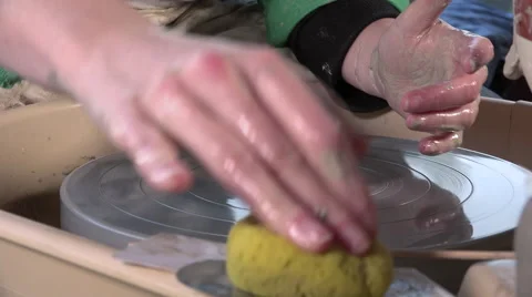 Potter working with clay Video stock 58784600