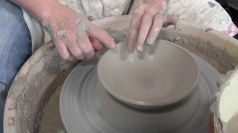 Potter working with clay Video stock 58787333