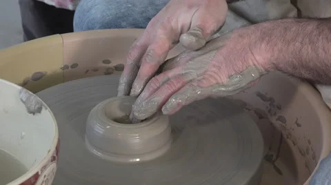 Potter working with clay Video stock 58792363