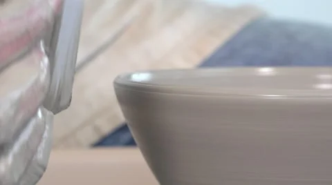 Potter working with clay Video stock 58796778