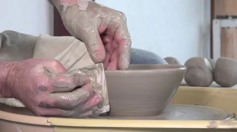 Potter working with clay Video stock 58797363