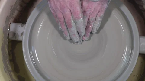 Potter working with clay Video stock 58799461