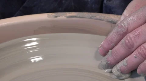 Potter working with clay Video stock 58799672