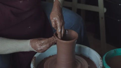 Potter working on clay jug Stock Footage 109283451