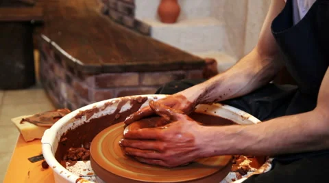 Potter working with clay in pottery Stock Footage 54486255