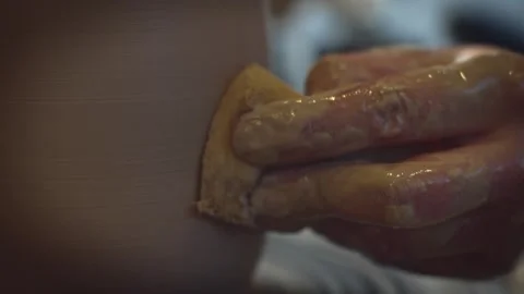 Potter working on a Potter's wheel making a vase Stock Footage 278311485