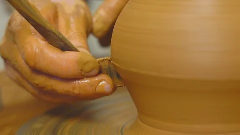 Potter works with clay Stock Footage 95677989