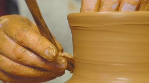 Potter works with clay Stock Footage 99436028