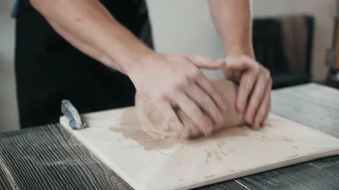 Pottering Concept, potter in workshop. Closeup of Hands of Male Worker in Apron Video stock 143268471