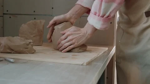 Pottering Concept, potter in workshop. Closeup of Hands of Potter Worker in Stock-Footage 151716321