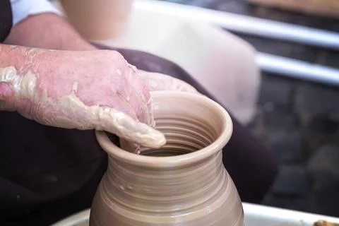 Potter's hands . ceramic ware of clay. pottery Stock Photos