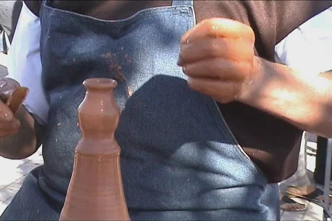 Potters hands creating a clay vase Video stock 100393