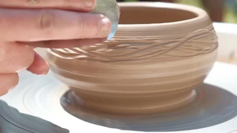 Potters hands do carving close up Stock Footage 220587185