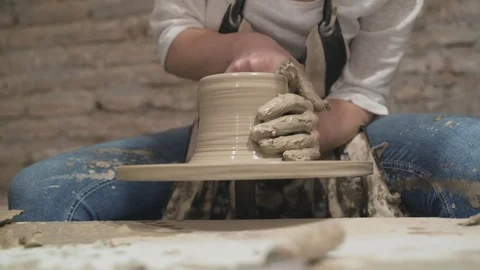 Potter's hands makes a pot Stock Footage 105135843