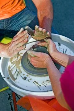 Potter's hands Stock Photos