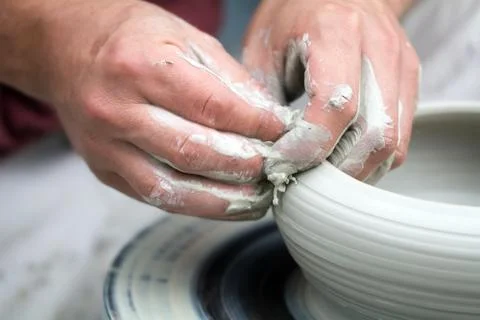 The potters hands Stock Photos