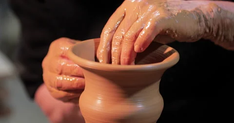 Potters wheel, hands forms clay pot on potter's wheel Stock Footage 147270540