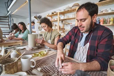 Potters at Work in a Ceramics Studio Foto stock