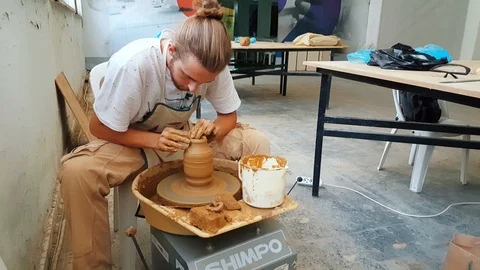 Pottery artist making clay pot at the 12th International Eskisehir Terra Cotta Stock Footage 104032332
