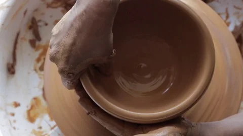 Pottery class workshop. Clay shaping on potter's wheel. Video stock 76758375
