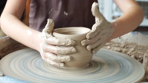 Pottery class workshop. Clay shaping on potter's wheel and firing. Stock Footage 82634871
