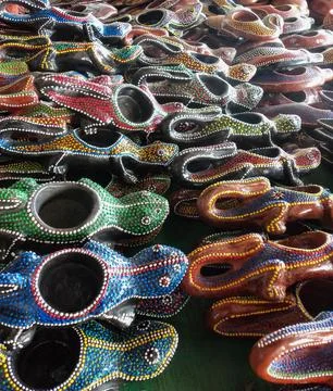 Pottery craft in the shape of gecko clogs from Lombok Stock Photos