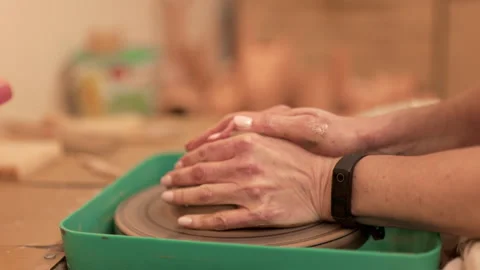 Pottery. The craft of throwing clay on a potter's wheel. Stock Footage 326768412