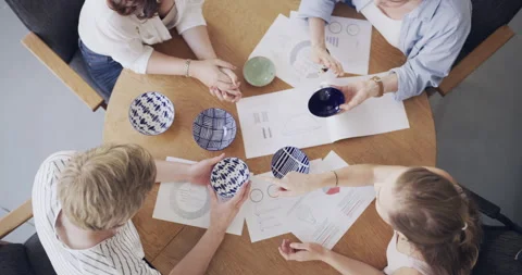 Pottery, documents and hands of people in workshop planning patterns for 動画素材 258335656