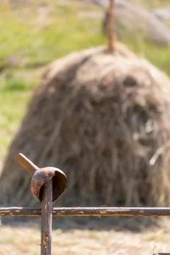Pottery on a fence with haystack Stock Photos