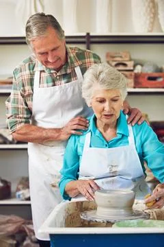 Pottery, help and elderly couple in workshop for learning hobby, arts and s.. Stock Photos