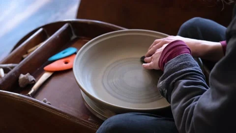 Pottery polishing process with 2 hands in the final step 스톡 동영상 182078163