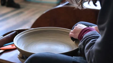 Pottery polishing process with 2 hands in the final step 스톡 동영상 182455473