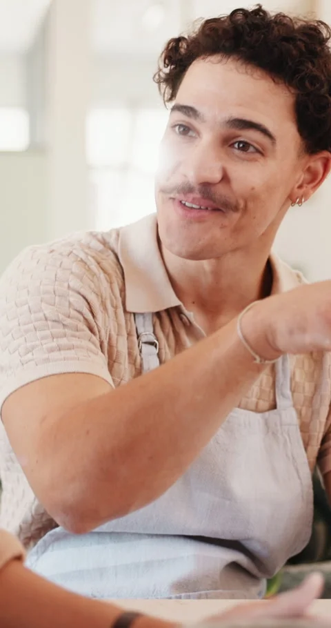 Pottery, talk and man in class for learning skill, sculpture design and smile in Stock Footage 333442876