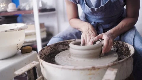 Pottery wheel, Hands work on ceramic clay workshop store. Small business Stock Footage 305703899
